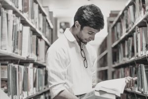 Man studying in a library