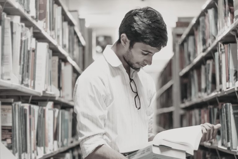 Man studying in a library