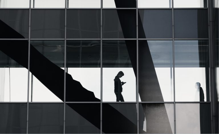 Worker in an office building from afar