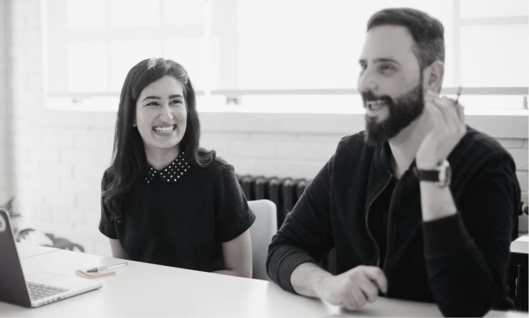 People collaborating in office environment during meeting